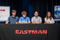 Eastman signs 4 students photo