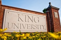 King University sign with flowers